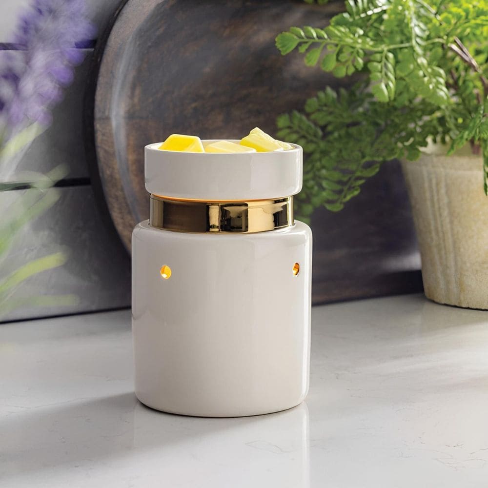 Zoom sur la surface blanche brillante et la bande dorée réfléchissante de la Lampe chauffe-cire électrique Blanc & Doré.