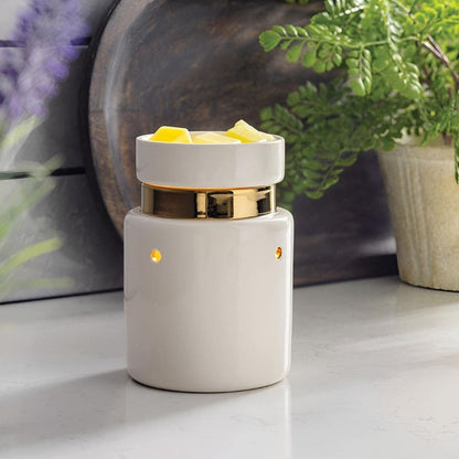 Zoom sur la surface blanche brillante et la bande dorée réfléchissante de la Lampe chauffe-cire électrique Blanc & Doré.