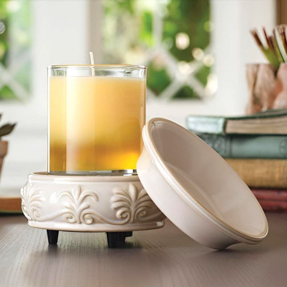 Base de la Lampe Fleur de Lys utilisée comme plaque chauffante électrique pour diffuser un pot de bougie parfumée sans flamme.